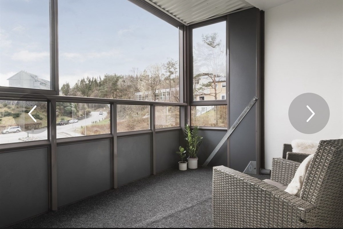Sørvendt innglasset balkong